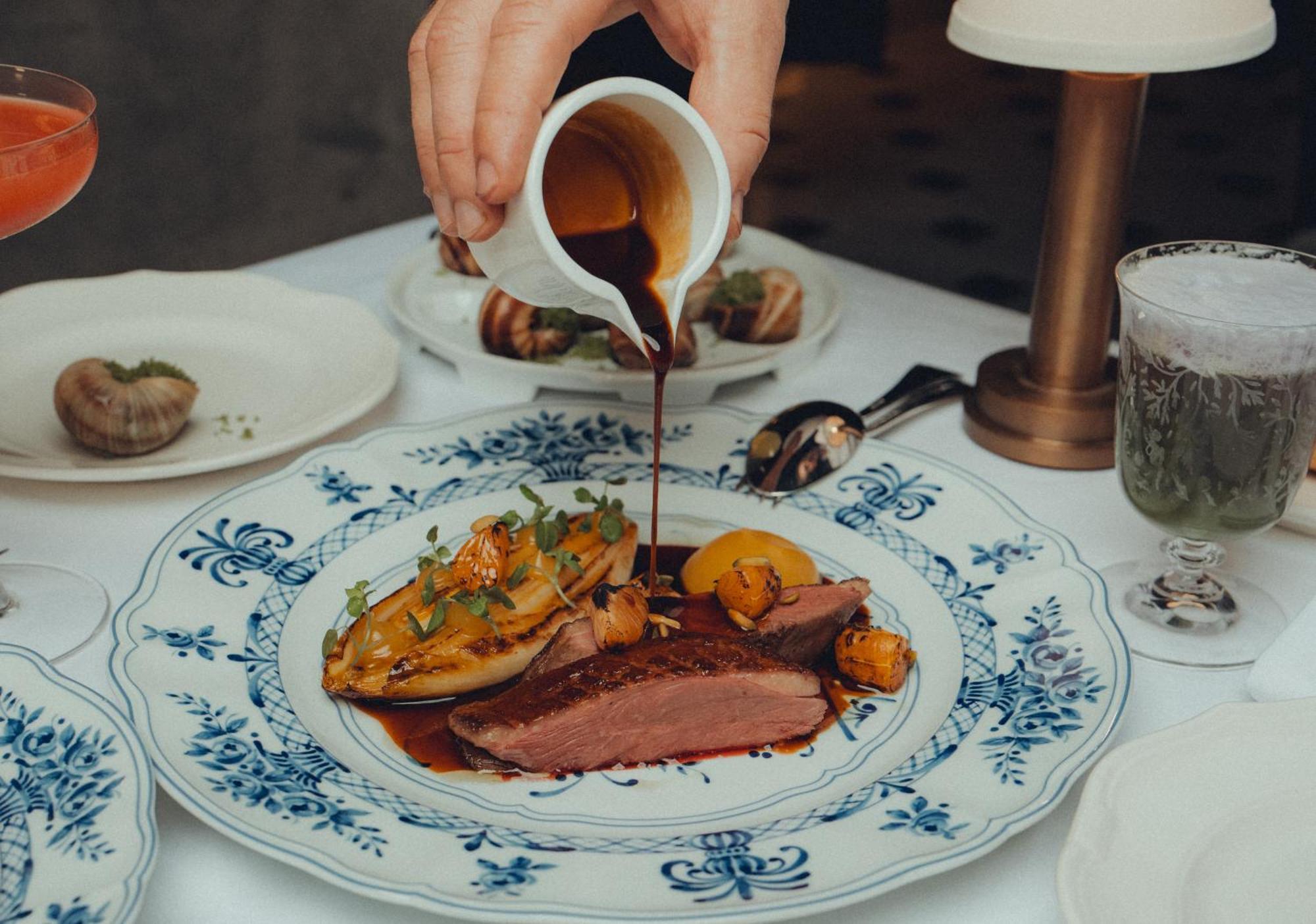 Hotel Five Luxe Dubai Esterno foto A duck dish at the restaurant