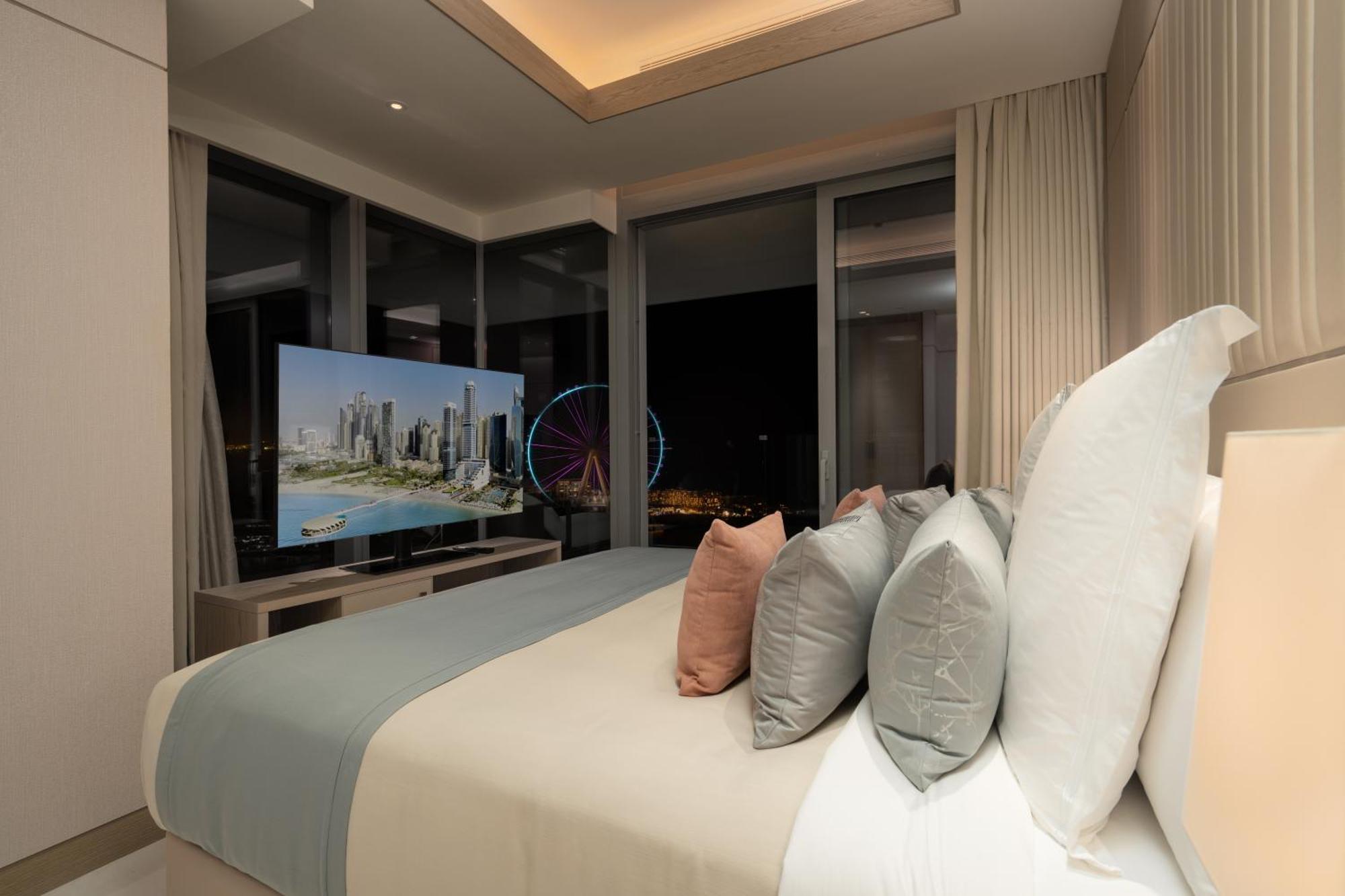 Hotel Five Luxe Dubai Esterno foto A bedroom at the Ritz-Carlton, DIFC